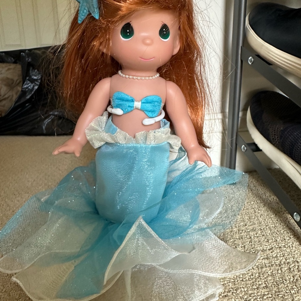 Precious Moments Ariel Doll with stand bought in Disney World